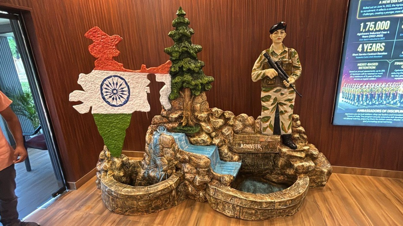 Agniveer event installation with soldier statue and India map